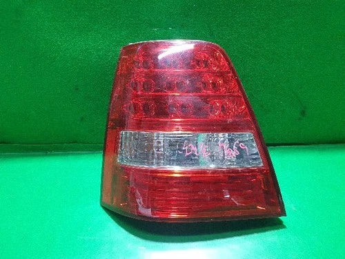 Left rear tail light assembly compatible with Kia Sorento 2006, genuine OEM replacement part 92401 3E000