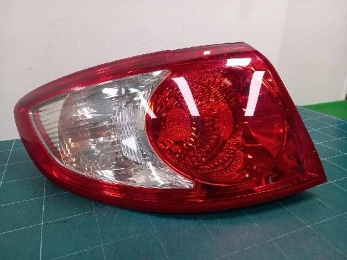 Left outer rear tail light assembly (combination) compatible with Hyundai Santa Fe 2007, genuine OEM replacement part 92401 2B000