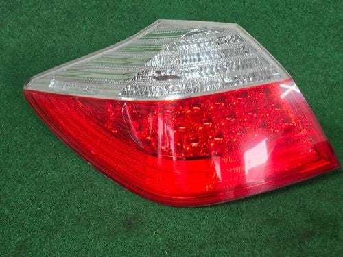 Left rear tail light assembly compatible with Hyundai Genesis Coupe 2012, genuine OEM replacement part 924013M000
