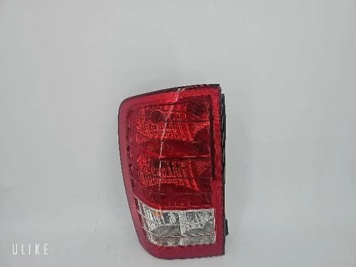 Left rear tail light assembly compatible with Kia Sedona 2010, genuine OEM replacement part 92401 4J000
