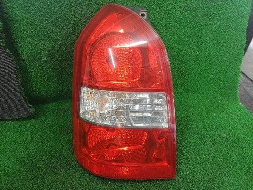 Left rear combination tail light assembly compatible with Hyundai Tucson 2006, genuine OEM replacement part 92401 2E100