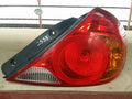 Right rear tail light assembly compatible with Kia Spectra 2000, genuine OEM replacement part 0K2N151150A