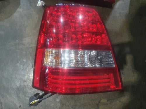 Left rear tail light assembly compatible with Kia Sorento 2006, genuine OEM replacement part 92401 3E500