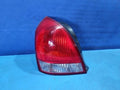 Left rear tail light assembly compatible with Hyundai Elantra 2003, genuine OEM replacement part 92401 2D300