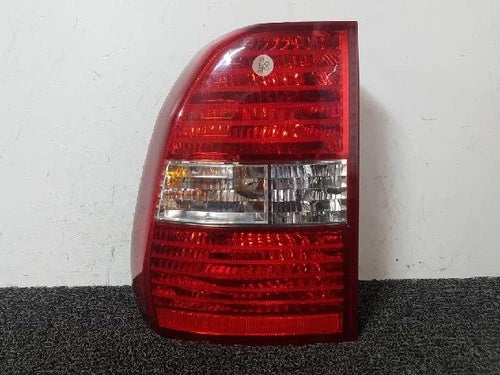 Left rear tail light assembly compatible with Kia Sportage 2004, genuine OEM replacement part 92401 1F001