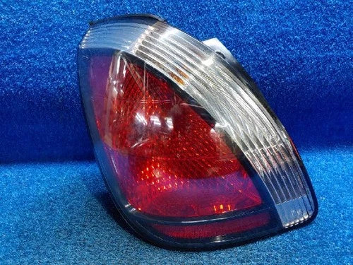 Left rear tail light assembly compatible with Kia Rio 2007, genuine OEM replacement part 92401 1G200