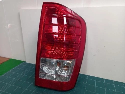 Used OEM Part - Combination Tail Light Assembly compatible with Kia Carnival 2010, genuine OEM replacement part 92402 4J000