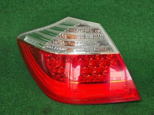 Left rear tail light assembly compatible with Hyundai Genesis Coupe 2012, genuine OEM replacement part 924013M000