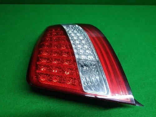 Left rear combination tail light assembly compatible with Kia Amanti 2010, genuine OEM replacement part 92401 3F801