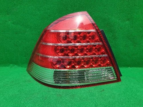 Left rear tail light assembly compatible with Ford Five Hundred 2005, genuine OEM replacement part 5T5313B505