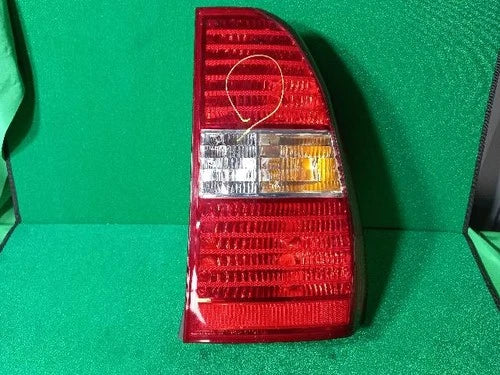 Used OEM Part - Tail light assembly compatible with Kia Sportage 2005, genuine OEM replacement part 92402-1F0