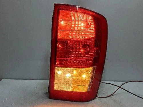 Used OEM Part - Combination Tail Light Assembly compatible with Kia Carnival 2010, genuine OEM replacement part 924024J000