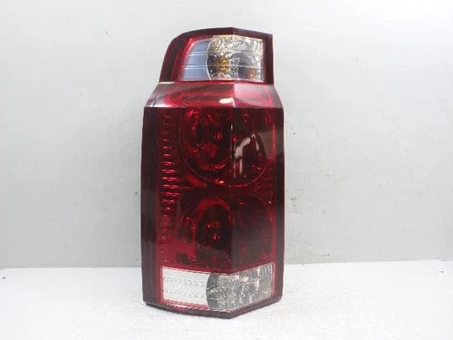 Left rear tail light assembly compatible with Jeep Commander 2008, genuine OEM replacement part 55157027AD