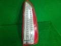 Rear tail light assembly compatible with Cadillac BLS 2006, genuine OEM replacement part 15777300