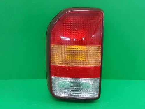 Left rear combination tail light compatible with Kia Sportage 2000, genuine OEM replacement part 0K0UA 51160