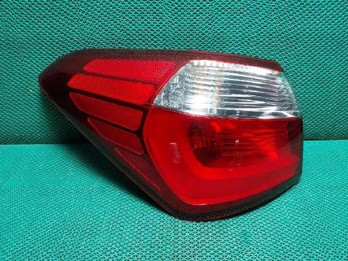 Used OEM Part - Combination Tail Light Assembly compatible with Kia Forte 2013, genuine OEM replacement part 92401A7000