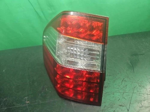 Left rear combination tail light assembly compatible with Kia Borrego 2008, genuine OEM replacement part 92401 2J100