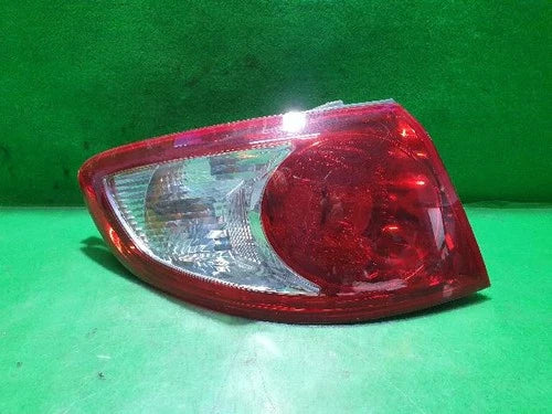 Left outer rear tail light assembly (combination) compatible with Hyundai Santa Fe 2009, genuine OEM replacement part 92401 2B000