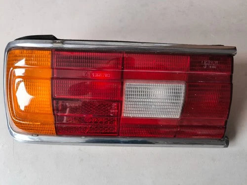 Left rear tail light (1361516) of BMW Series 5 E12 520, genuine and poco common, damaged