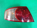 Left rear combination tail light assembly compatible with Kia Amanti 2006, genuine OEM replacement part 92401 3F270