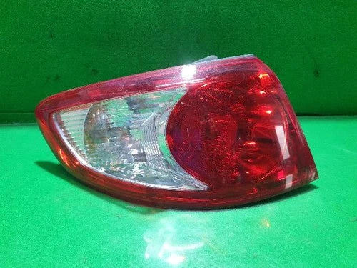 Left outer rear tail light assembly (combination) compatible with Hyundai Santa Fe 2007, genuine OEM replacement part 92401 2B000