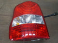 Left rear combination tail light compatible with Kia Carnival 2004, genuine OEM replacement part 1K53A51160