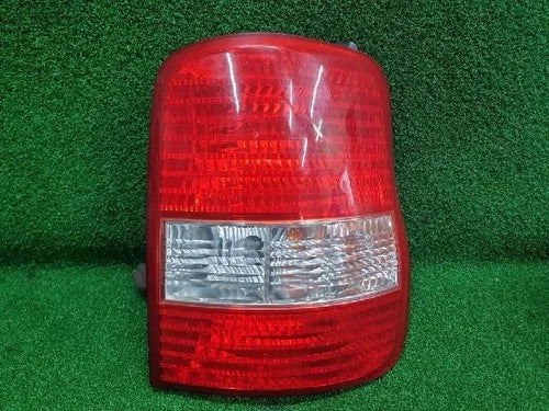 Right rear combination tail light assembly compatible with Kia Carnival 2001, genuine OEM replacement part 0K53A 51150