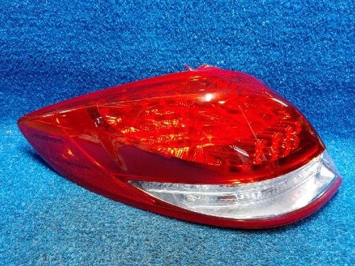Left rear tail light assembly compatible with Hyundai Veloster 2011, genuine OEM replacement part 924012V120