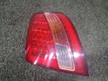 Left rear tail light assembly compatible with Kia Amanti 2008, genuine OEM replacement part 92401 3F500