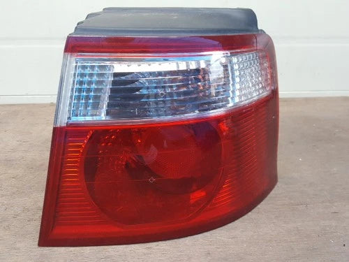 Right outer rear tail light assembly compatible with Kia Carens 2002, genuine OEM replacement part 0K2FB51150