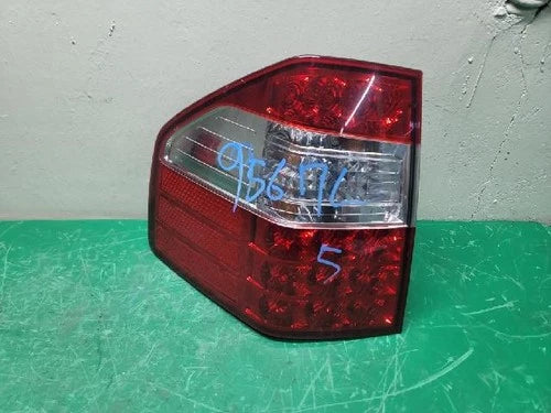 Left rear combination tail light assembly compatible with Kia Borrego 2008, genuine OEM replacement part 92401 2J100