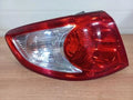 Left outer rear tail light assembly (combination) compatible with Hyundai Santa Fe 2007, genuine OEM replacement part 92401 2B000
