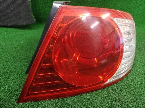 Right rear combination tail light assembly compatible with Kia Amanti 2003, genuine OEM replacement part 92402 3F070