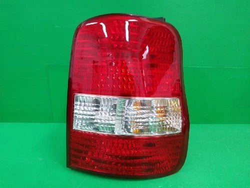 Used OEM Part - Tail light assembly compatible with Kia Carnival 2005, genuine OEM replacement part 1K53A 51150