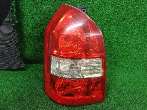 Left rear combination tail light assembly compatible with Hyundai Tucson 2006, genuine OEM replacement part 92401 2E100