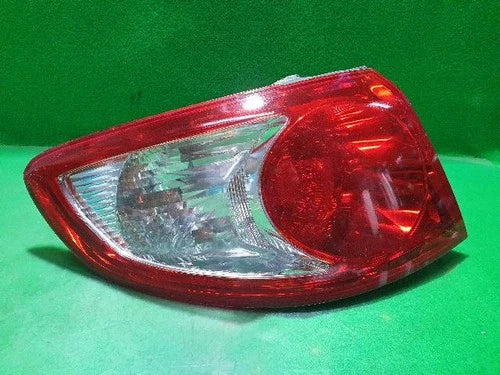 Left outer rear tail light assembly (combination) compatible with Hyundai Santa Fe 2008, genuine OEM replacement part 92401 2B000