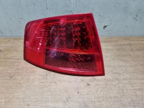 Left outer rear tail light assembly compatible with Audi A8 3.7 quattro 2006, genuine OEM replacement part 4E0945095C