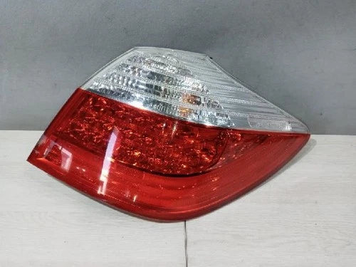 Right rear combination tail light assembly compatible with Hyundai Genesis Coupe 2010, genuine OEM replacement part 924023M060