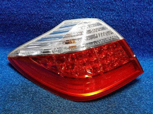 Left rear tail light assembly compatible with Hyundai Genesis Coupe 2012, genuine OEM replacement part 924013M0