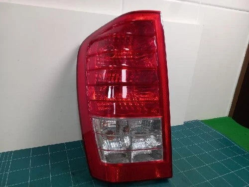 Left rear tail light assembly compatible with Kia Carnival 2011, genuine OEM replacement part 92401 4J000