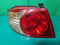 Left rear combination tail light assembly compatible with Kia Amanti 2006, genuine OEM replacement part 92401 3F270