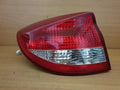 Used OEM Part - Tail light assembly compatible with Kia SF 4DR 1.5 Si 2002, genuine OEM replacement part 92401 FD000