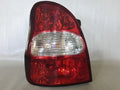 Left rear combination tail light compatible with Kia Carnival 2000, genuine OEM replacement part 0K552 51160A