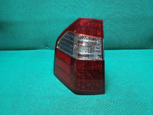 Left rear tail light assembly compatible with Kia Borrego 2008, genuine OEM replacement part 924012J100