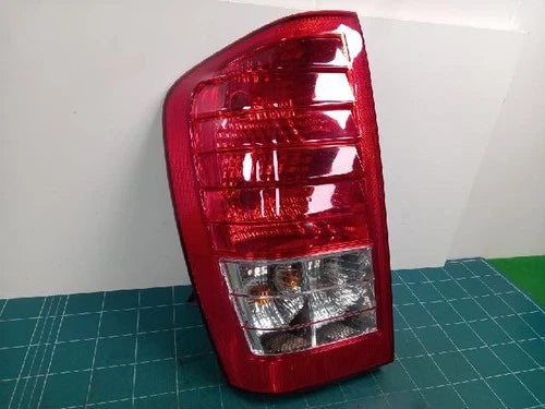 Left rear tail light assembly compatible with Kia Carnival 2011, genuine OEM replacement part 92401 4J000