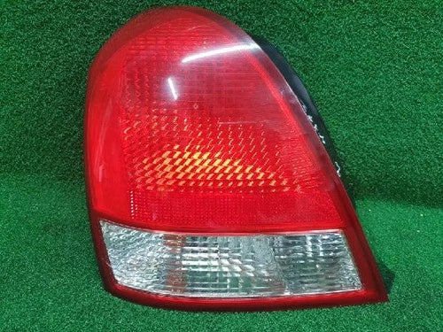 Left rear tail light assembly compatible with Hyundai Elantra 2002, genuine OEM replacement part 92401 2D300