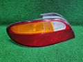Left rear tail light assembly compatible with Hyundai Elantra 1999, genuine OEM replacement part 92401 29500