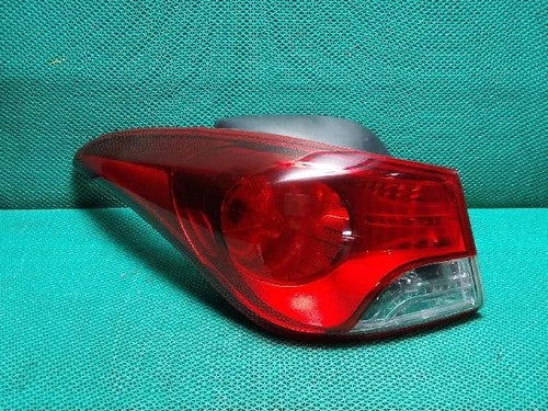 Left rear tail light assembly compatible with Hyundai Elantra 2012, genuine OEM replacement part 924013X000