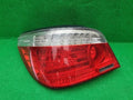 Left rear tail light assembly compatible with BMW 530i sedan 2009, genuine OEM replacement part 195 285-01