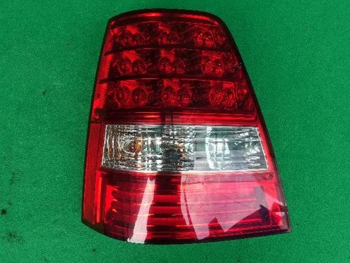 Left rear tail light assembly compatible with Kia Sorento 2009, genuine OEM replacement part 92401 3E500
